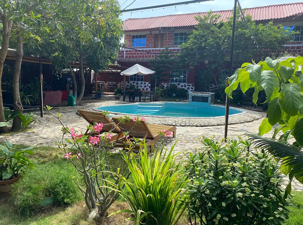 Sunbeds In Front Of The Swimming Pool