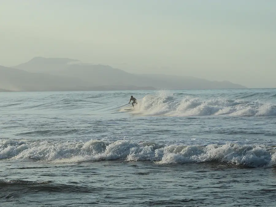 Surfer Riding The Wave On The Buritaca Beach